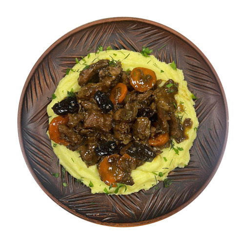 Телятина тушкована з чорносливом